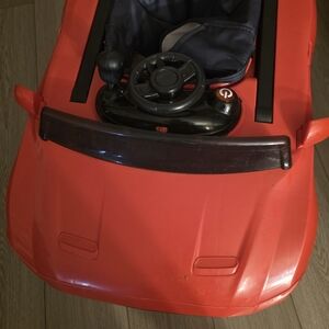 Red Toy Car with Steering Wheel